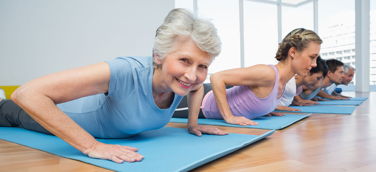 ladies exercising on floor mat